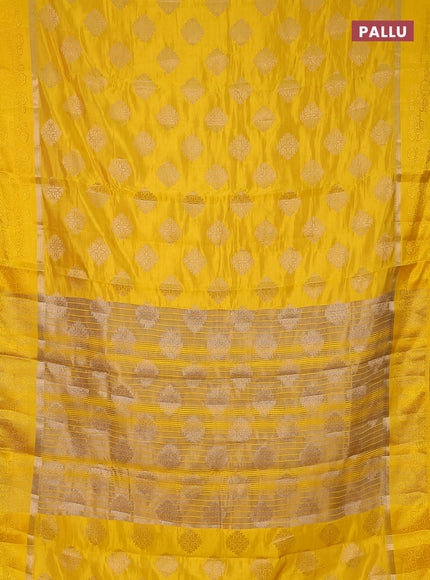 Semi raw silk saree yellow with zari woven buttas and zari woven simple border