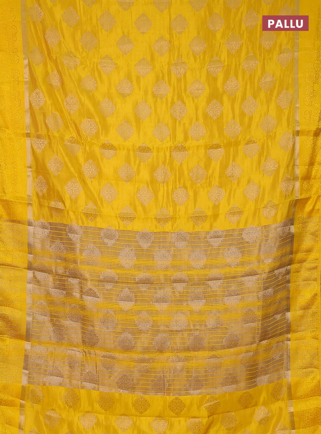 Semi raw silk saree yellow with zari woven buttas and zari woven simple border