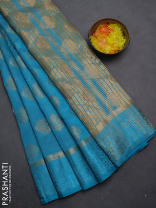 Semi raw silk saree teal blue with zari woven buttas and zari woven simple border