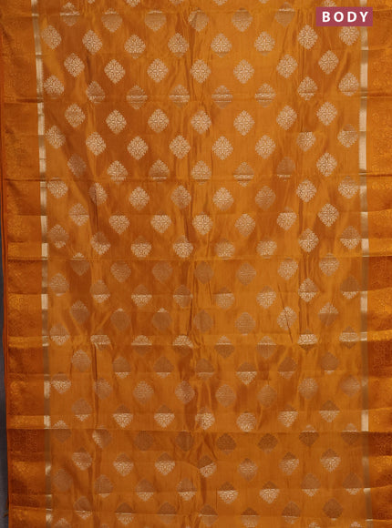 Semi raw silk saree mustard yellow with zari woven buttas and zari woven simple border