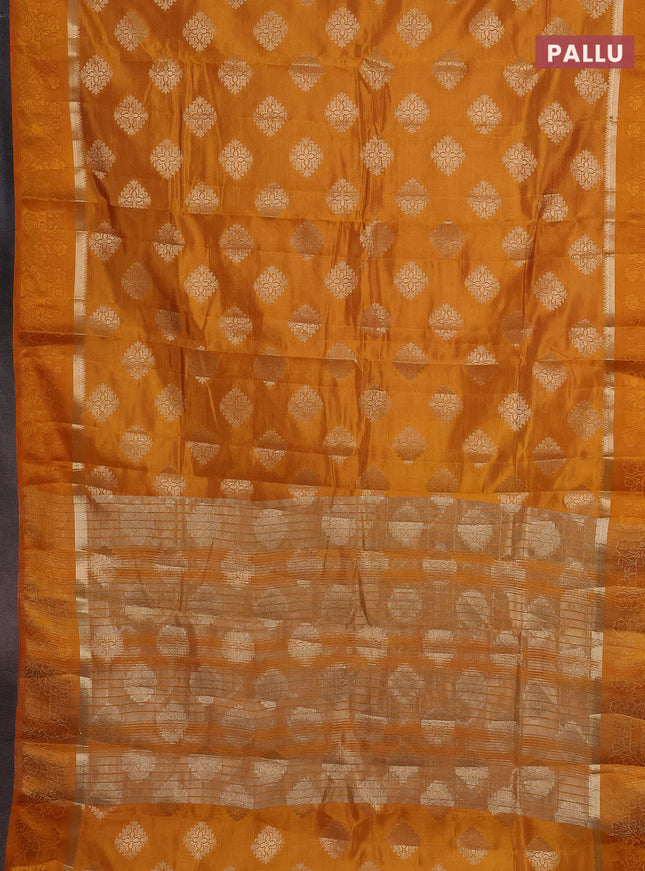 Semi raw silk saree mustard yellow with zari woven buttas and zari woven simple border