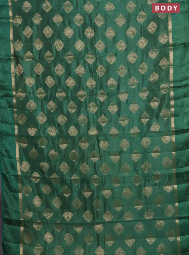 Semi raw silk saree green with zari woven buttas and zari woven simple border
