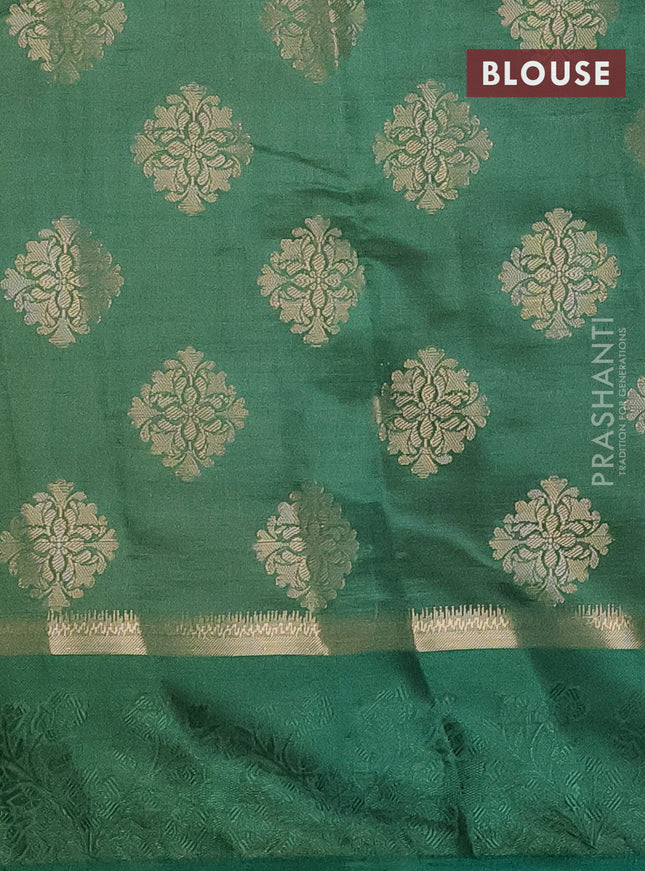 Semi raw silk saree green with zari woven buttas and zari woven simple border