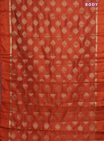 Semi raw silk saree rustic orange with zari woven buttas and zari woven simple border