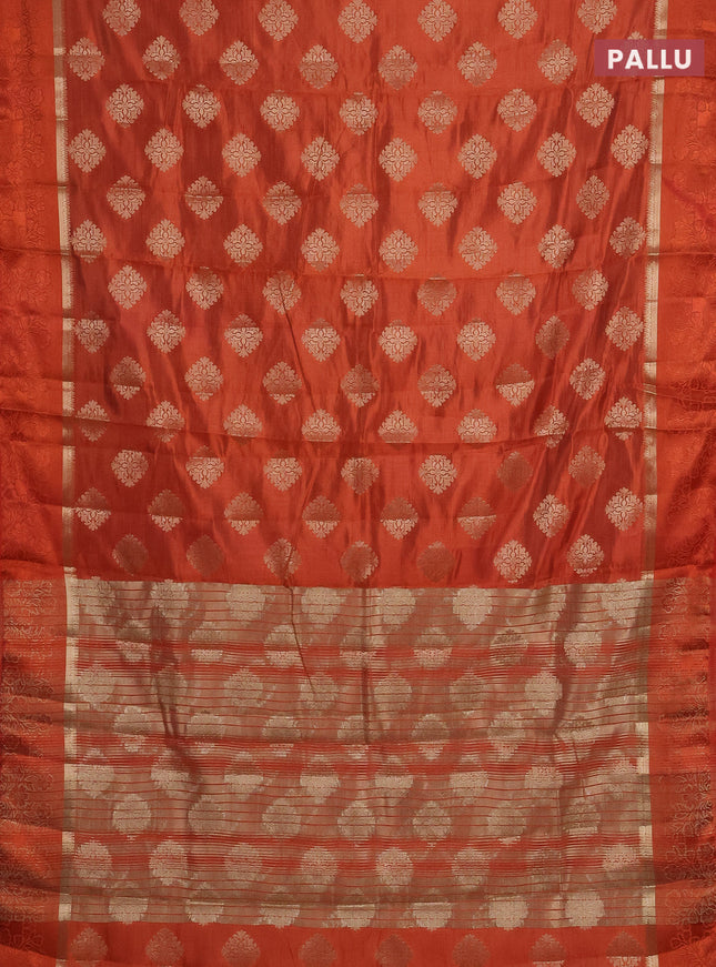 Semi raw silk saree rustic orange with zari woven buttas and zari woven simple border