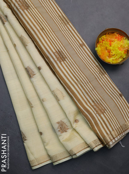 Semi raw silk saree cream with woven buttas and zari woven border