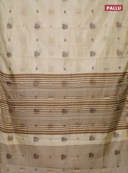 Semi raw silk saree cream with woven buttas and zari woven border