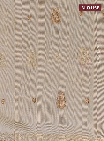 Semi raw silk saree cream with woven buttas and zari woven border