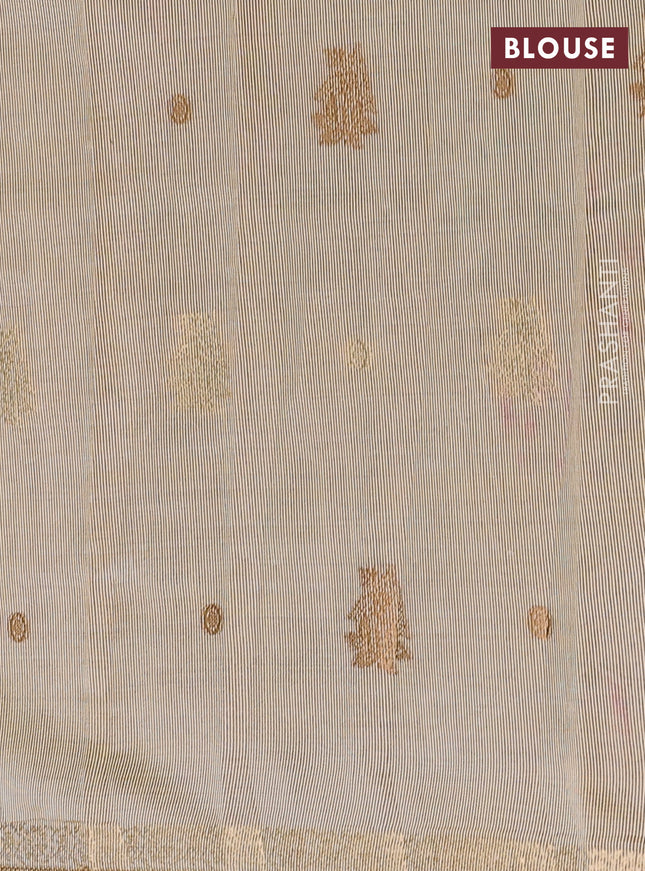 Semi raw silk saree cream with woven buttas and zari woven border