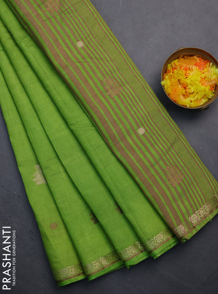 Semi raw silk saree light green with woven buttas and zari woven border