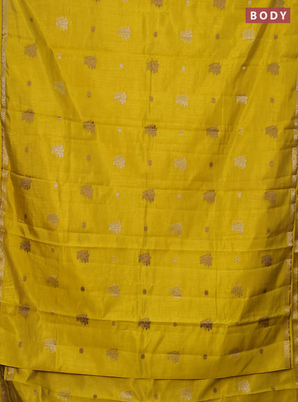 Semi raw silk saree yellow with woven buttas and zari woven border