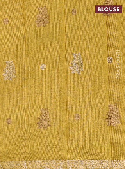 Semi raw silk saree yellow with woven buttas and zari woven border