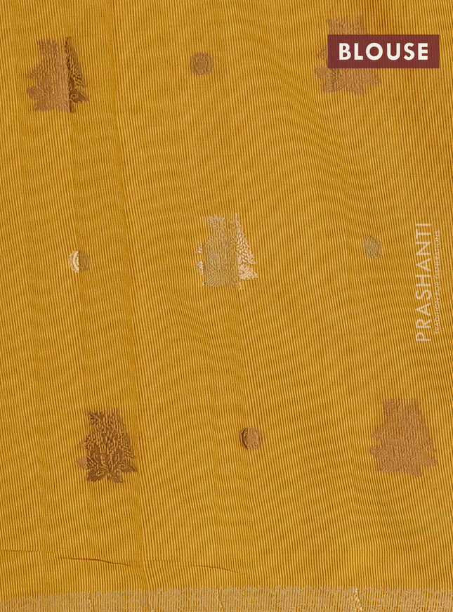 Semi raw silk saree yellow with woven buttas and zari woven border