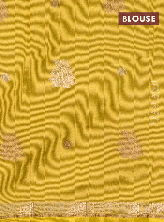 Semi raw silk saree lime yellow with woven buttas and zari woven border