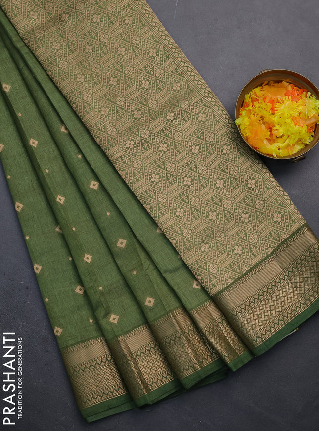 Semi raw silk saree sap green with zari woven buttas and zari woven border