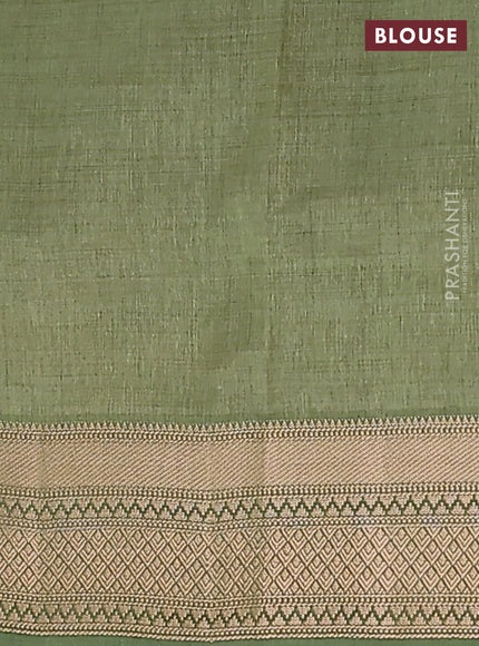 Semi raw silk saree sap green with zari woven buttas and zari woven border