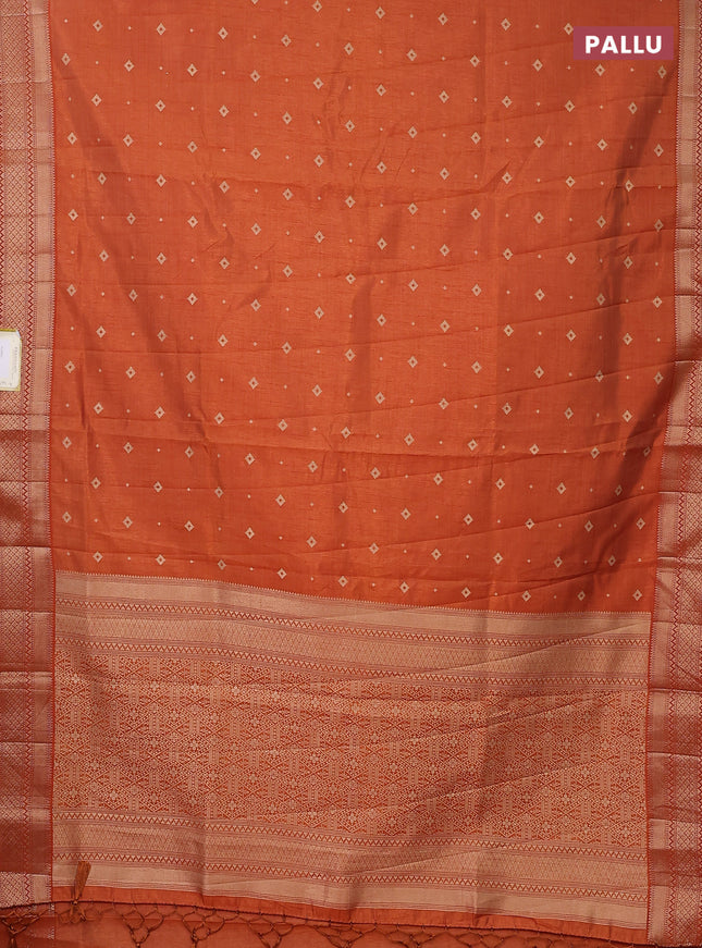 Semi raw silk saree rustic orange with zari woven buttas and zari woven border