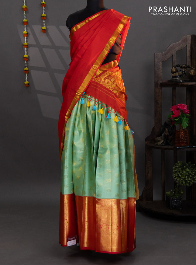 Pure kanchipuram silk lehenga pastel green and red with allover zari checks & annam buttas and long zari woven border