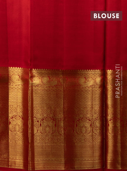 Pure kanchipuram silk lehenga pastel green and red with allover zari checks & annam buttas and long zari woven border