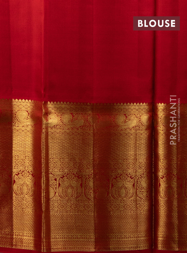 Pure kanchipuram silk lehenga pastel green and red with allover zari checks & annam buttas and long zari woven border