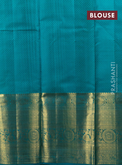Pure kanchipuram silk lehenga mustard yellow and teal blue with allover zari woven buttas and long annam zari woven border