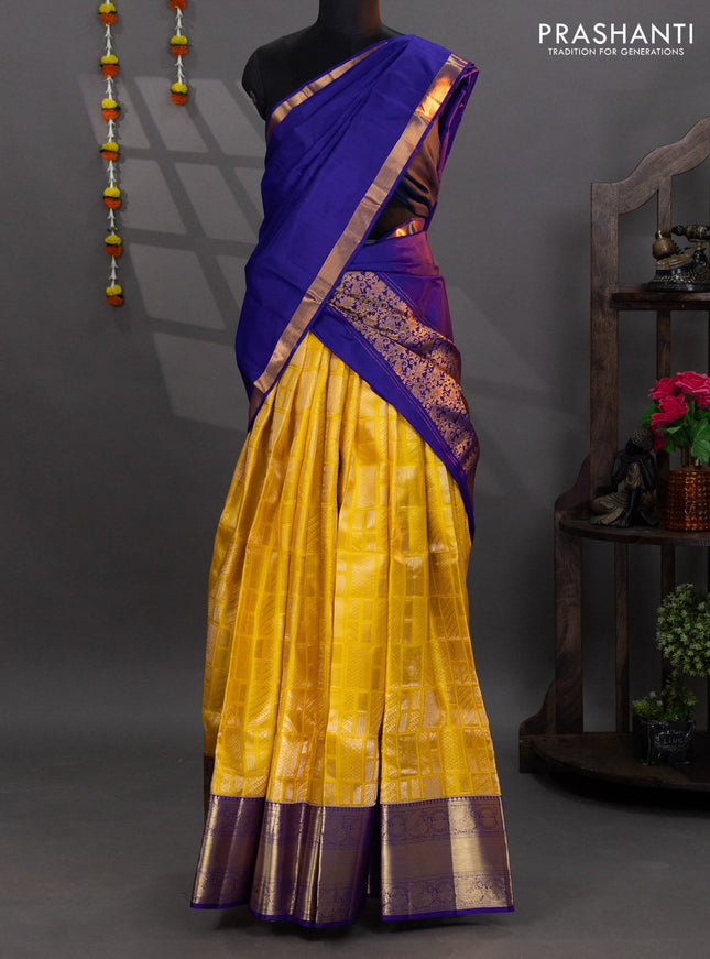 Pure kanchipuram silk lehenga yellow and blue with allover brocade weaves and annam zari woven border