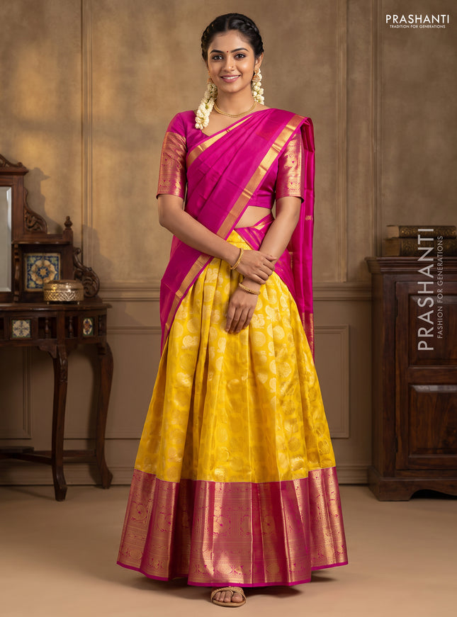 Pure kanchipuram silk lehenga yellow and pink with annam & mayil chakkaram zari woven buttas and long annam zari woven border