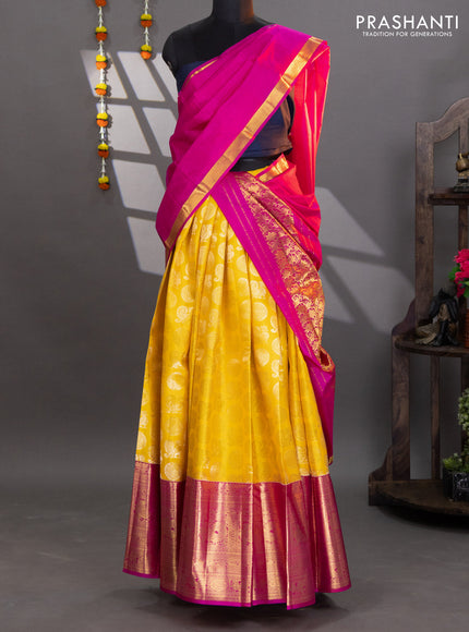 Pure kanchipuram silk lehenga yellow and pink with annam & mayil chakkaram zari woven buttas and long annam zari woven border