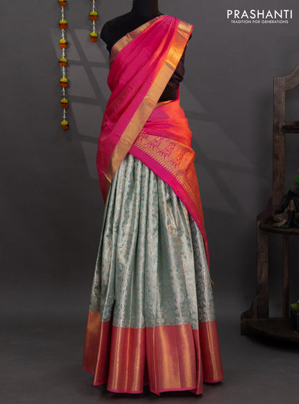 Pure kanchipuram tissue silk lehenga pastel blue and peach pink with allover brocade weaves and long zari woven border