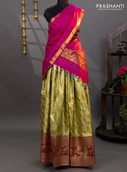 Pure kanchipuram tissue silk lehenga fluorescent green and pink with allover brocade weaves and long zari woven border
