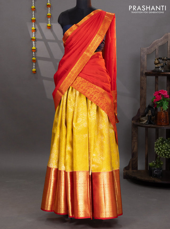 Pure kanchipuram silk lehenga yellow and red with allover brocade weaves and long zari woven border