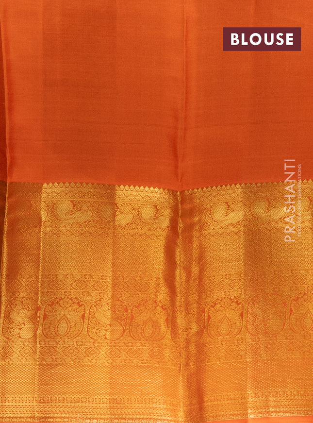 Pure kanchipuram silk lehenga purple and orange with allover brocade weaves and long zari woven border