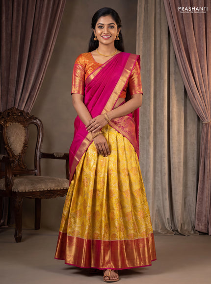 Pure kanchipuram tissue silk lehenga yellow and pink with allover brocade weaves and annam zari woven border