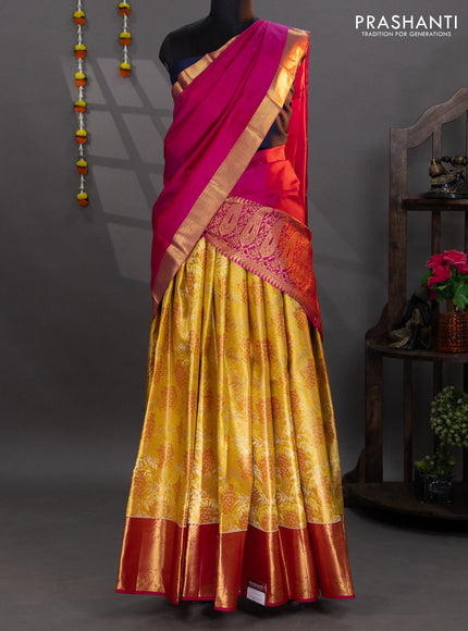 Pure kanchipuram tissue silk lehenga yellow and pink with allover brocade weaves and annam zari woven border