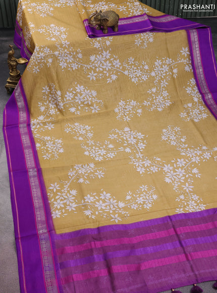 Maheshwari silk cotton saree sandal and purple with allover digital prints and rettapet thread woven border