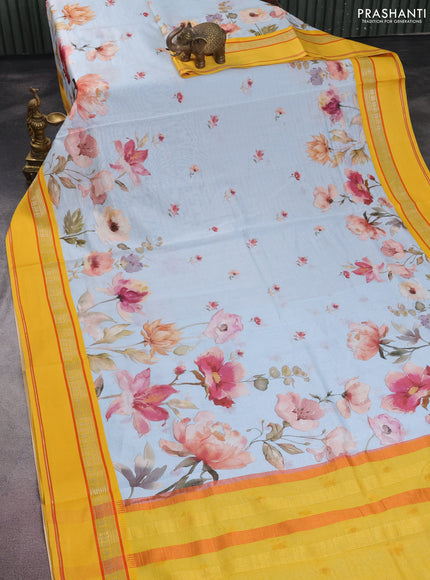 Maheshwari silk cotton saree light blue and yellow with allover floral digital butta prints and rettapet thread woven border