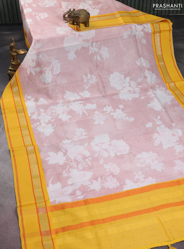 Maheshwari silk cotton saree pastel peach and yellow with allover floral digital prints and rettapet thread woven border