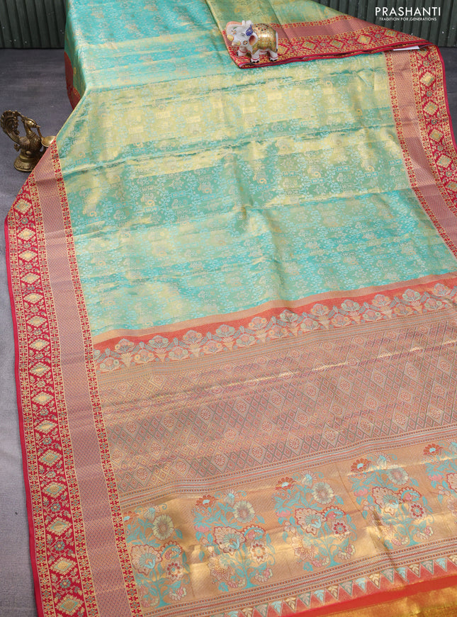 Pure kanchipuram tissue silk saree teal green and pink with allover zari woven brocade pattern and rich zari minakari border