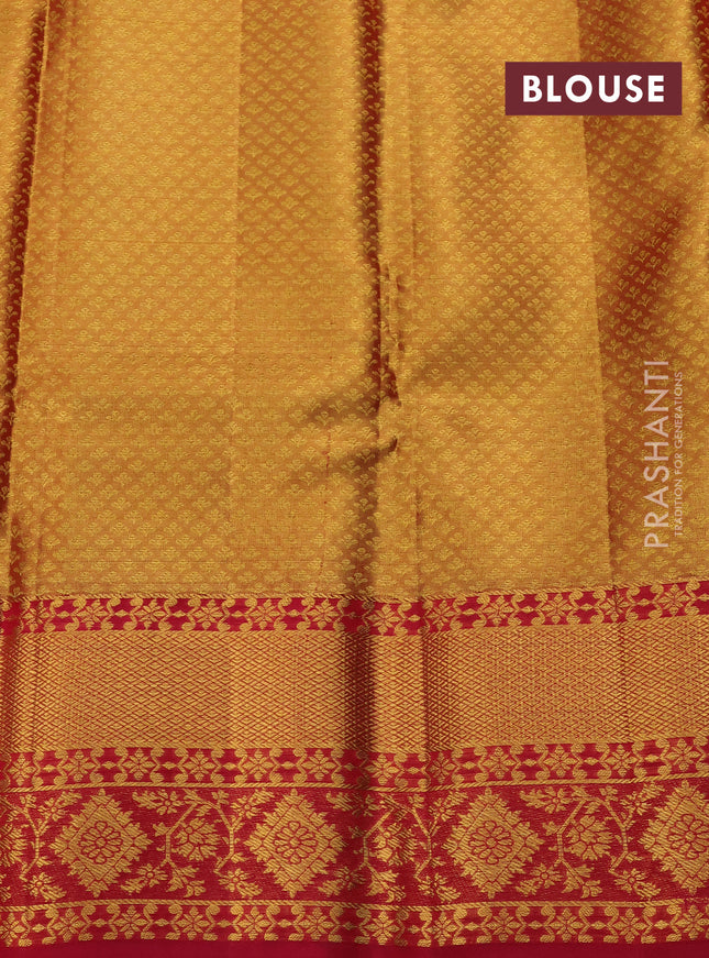 Pure kanchipuram tissue silk saree teal green and pink with allover zari woven brocade pattern and rich zari minakari border