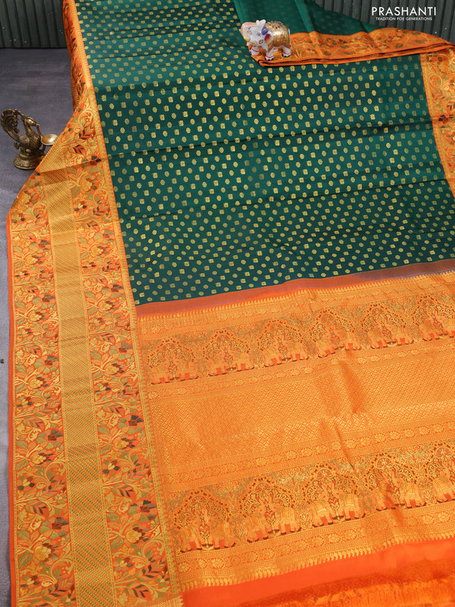 Pure kanchipuram silk saree green and orange with annam & floral zari woven buttas and long rich minakari border