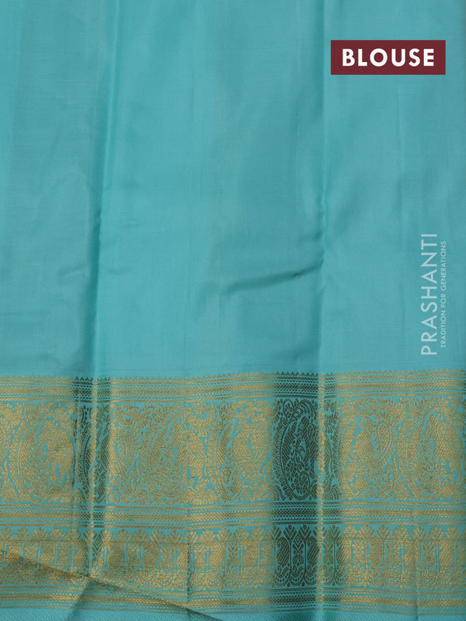 Kanchipuram kora silk saree peach shade and teal blue with allover silver zari weaves and zari woven border