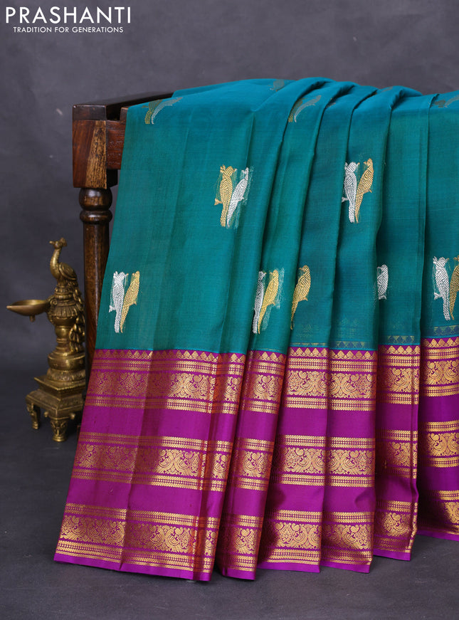Kanchipuram kora silk saree teal green and purple with silver & gold zari woven buttas and long zari woven border
