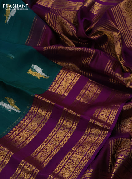 Kanchipuram kora silk saree teal green and purple with silver & gold zari woven buttas and long zari woven border