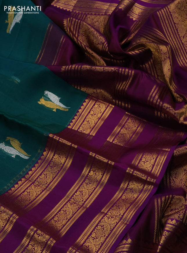Kanchipuram kora silk saree teal green and purple with silver & gold zari woven buttas and long zari woven border