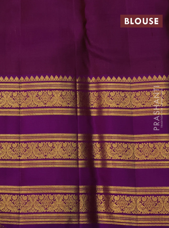 Kanchipuram kora silk saree teal green and purple with silver & gold zari woven buttas and long zari woven border