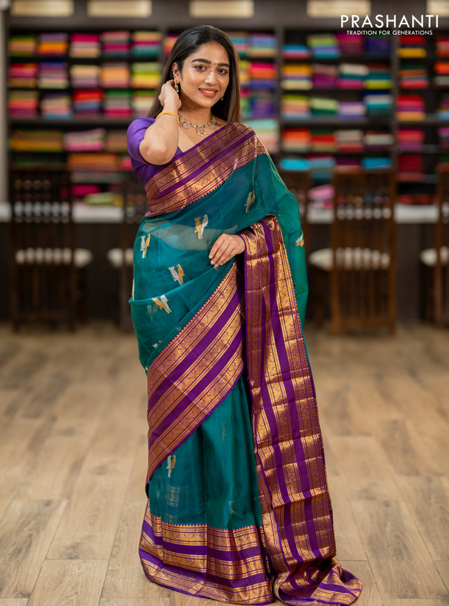Kanchipuram kora silk saree teal green and purple with silver & gold zari woven buttas and long zari woven border