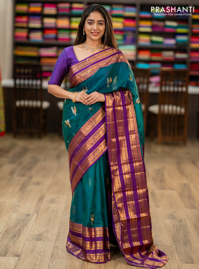 Kanchipuram kora silk saree teal green and purple with silver & gold zari woven buttas and long zari woven border