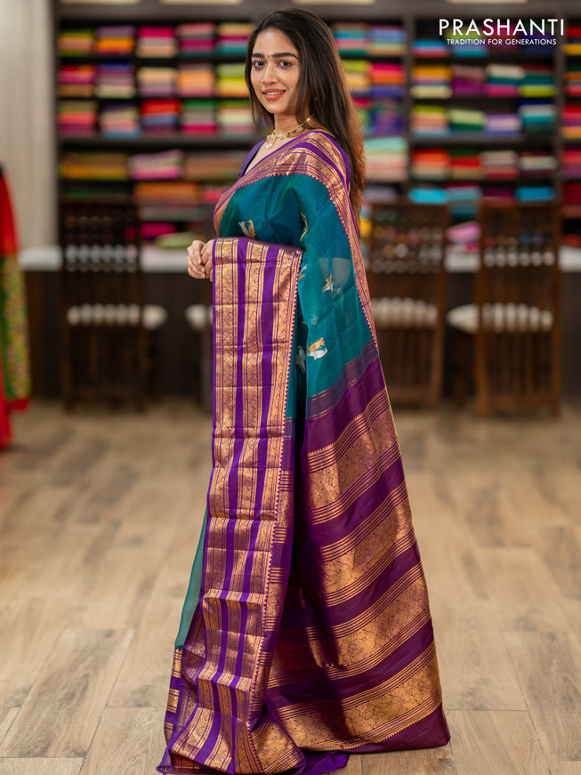 Kanchipuram kora silk saree teal green and purple with silver & gold zari woven buttas and long zari woven border