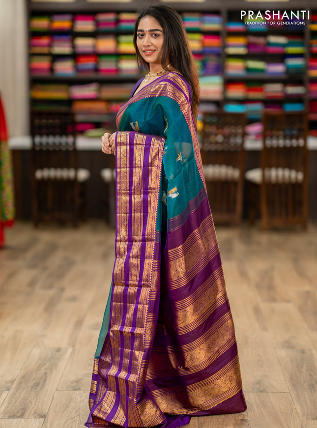 Kanchipuram kora silk saree teal green and purple with silver & gold zari woven buttas and long zari woven border