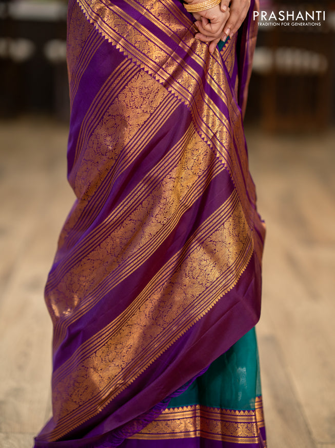 Kanchipuram kora silk saree teal green and purple with silver & gold zari woven buttas and long zari woven border